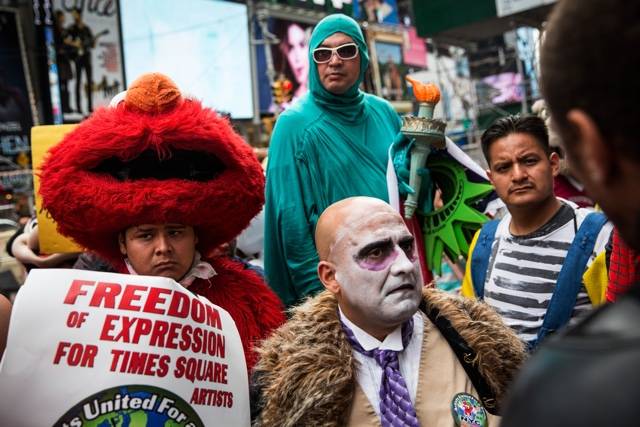 Costumed characters protesting an earlier version of King's licensing bill in September 2014